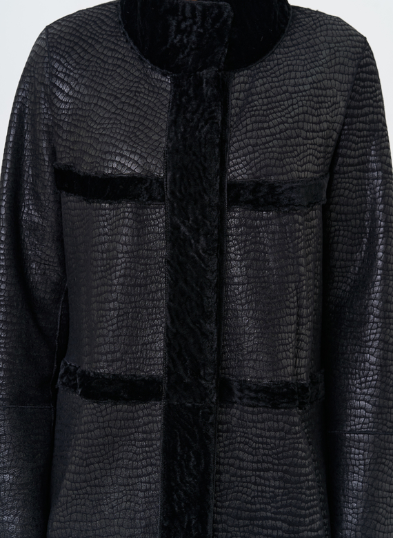 Женская двухсторонняя дубленка черного цвета